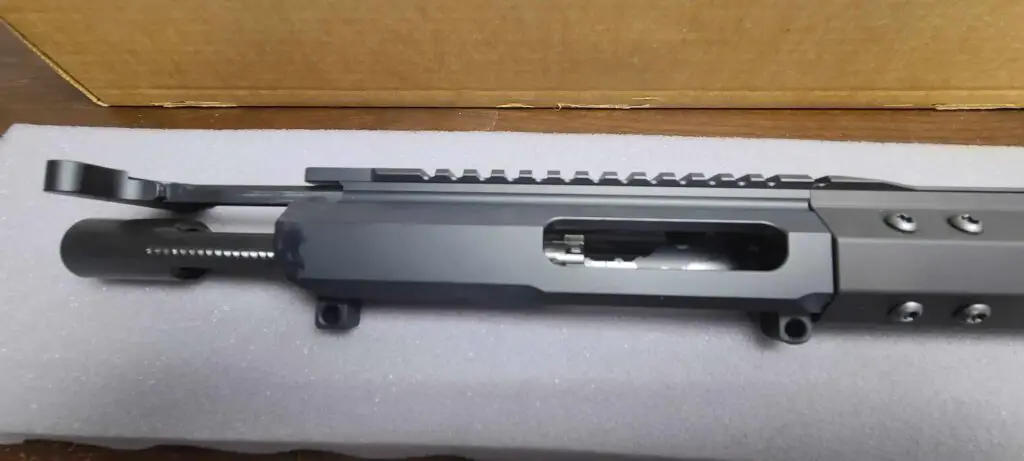 AR Stonner Upper Receiver with Charging Handle and Bolt Carrier Group Black in color